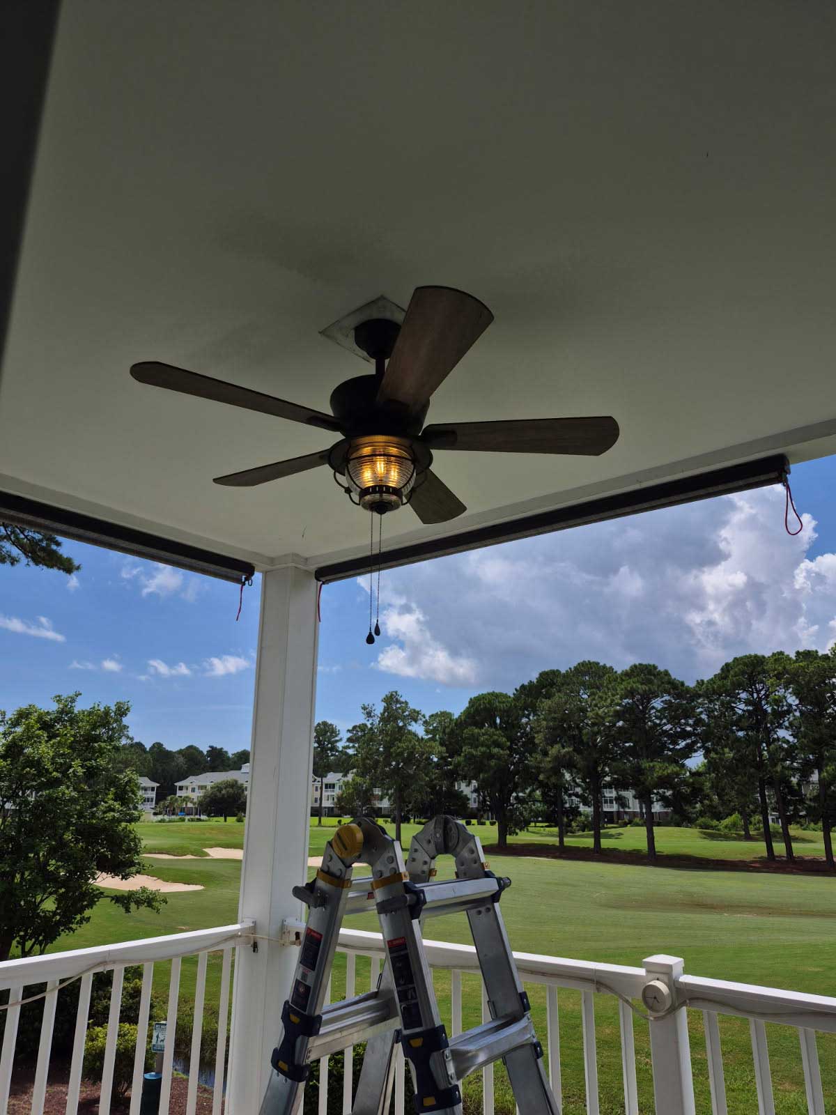 Ceiling fan repair at a short term golf course rental